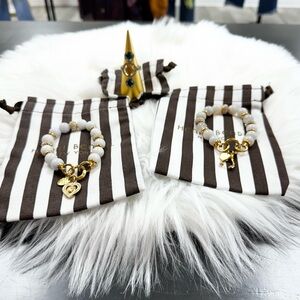 Set of three Henri Bendel costume jewelry pieces